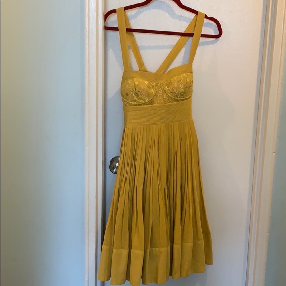 Mustard Anthropologie A-line dress with full skirt